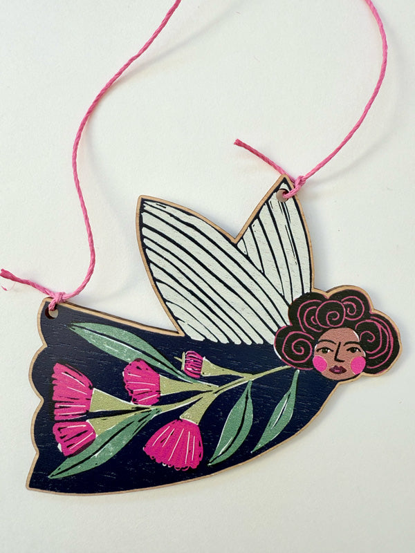 Wooden Christmas Fairy Ornament featuring flowering gum design, strung with hemp cord, made in Australia and available to wholesale. 