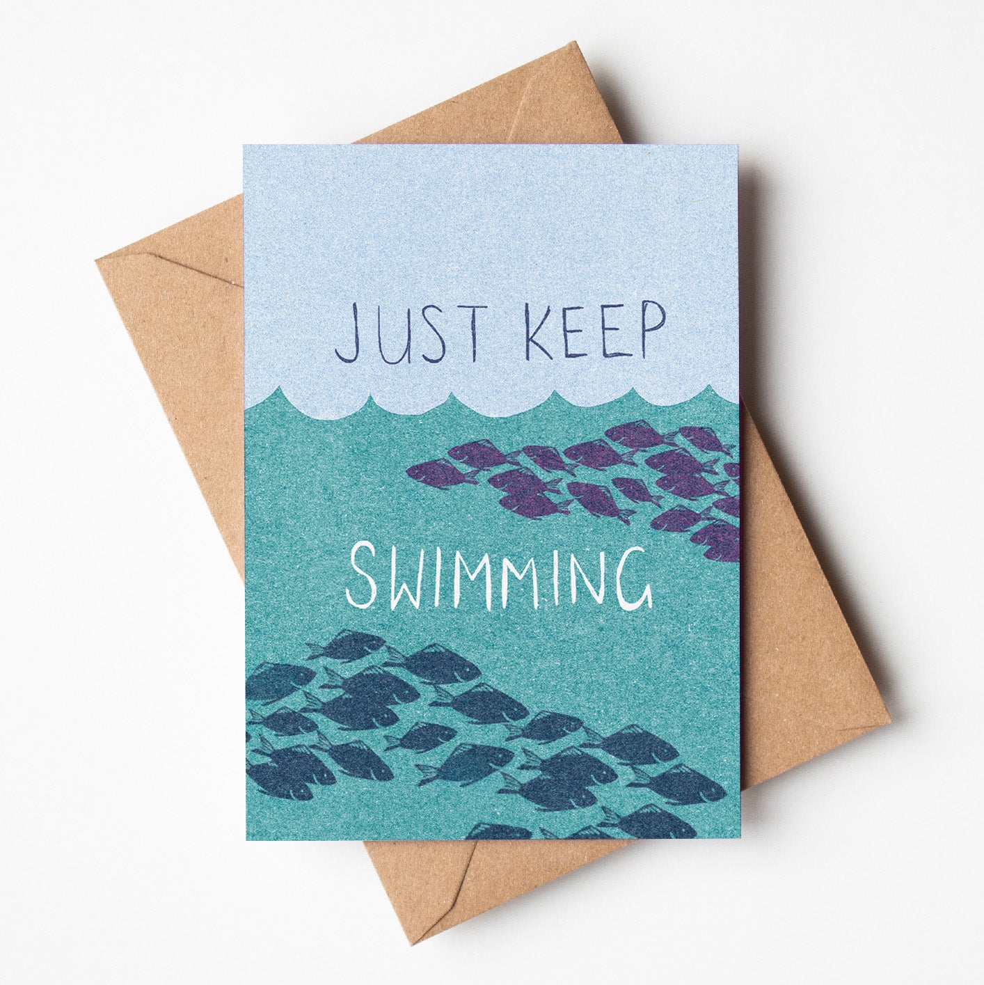 Uplifting greeting card featuring the phrase 'Just Keep Swimming', made in Australia, available for wholesale. 