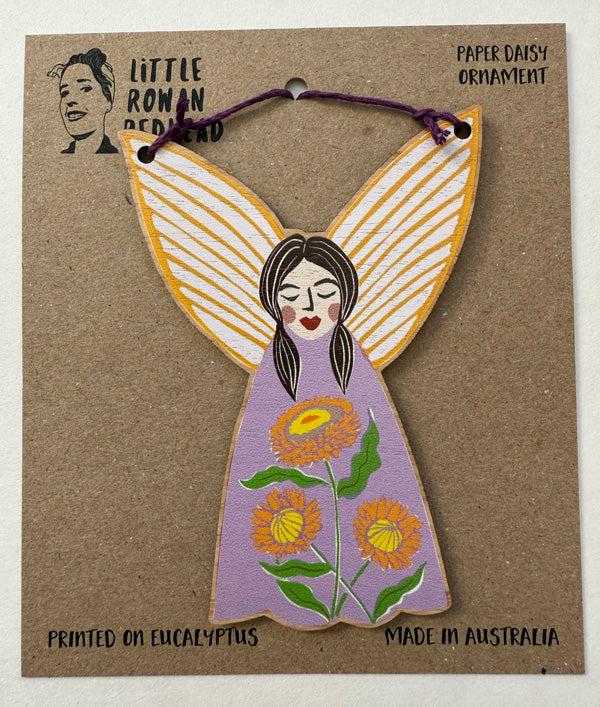 Wooden Christmas fairy ornament made in Australia, featuring paper daisies and strung with hemp cord on a Kraft backing card, available for wholesale. 