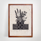 Framed linoprint artwork featuring a still life of a vase containing Australian flowers.