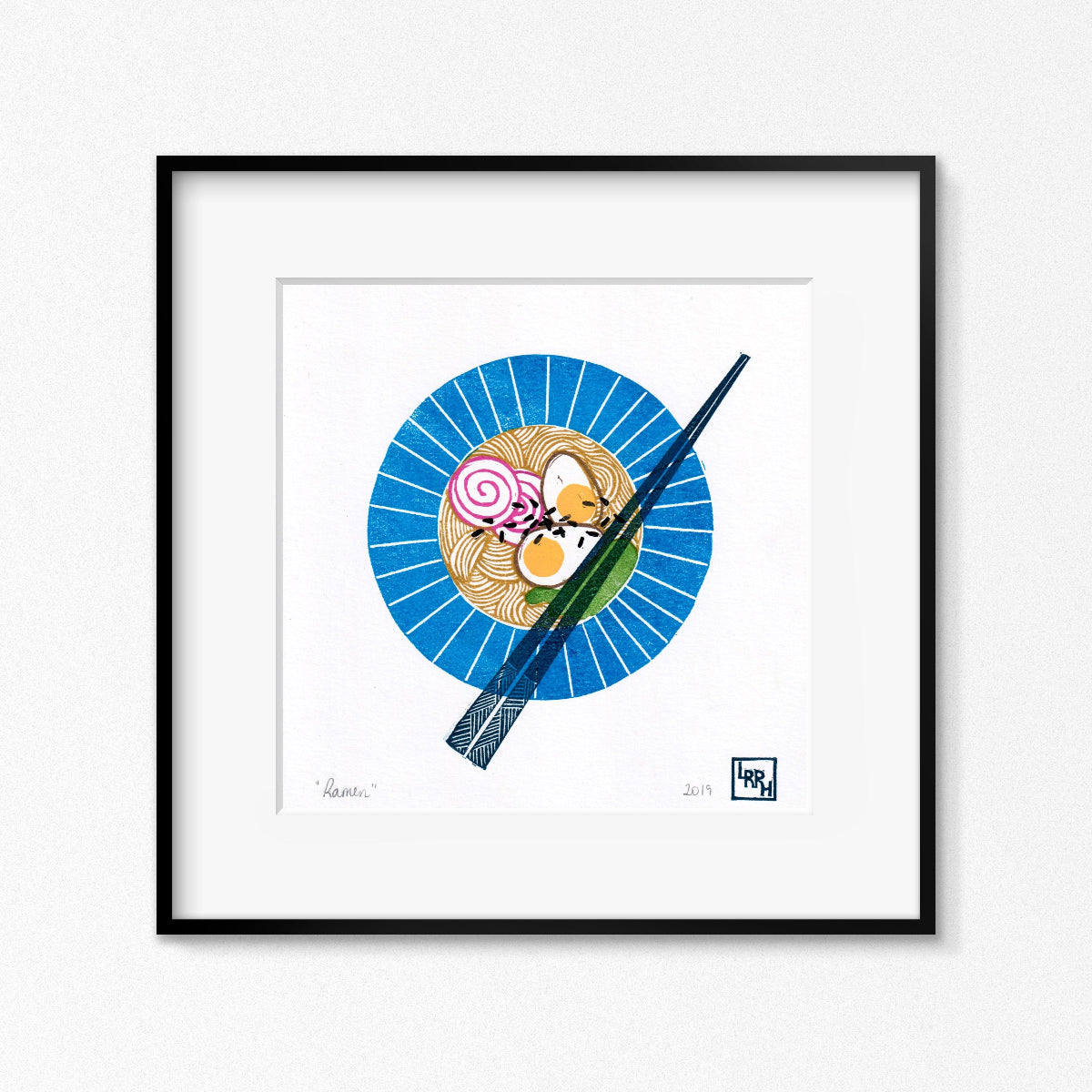 A framed handmade linoprint featuring a top-down view of a bowl of ramen and chopsticks, affordable art, made in Australia