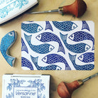 Image of printed fish pattern, block printing, rubber stamp, printmaking class